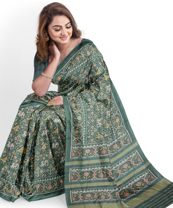 Dark green handloom cotton patola saree