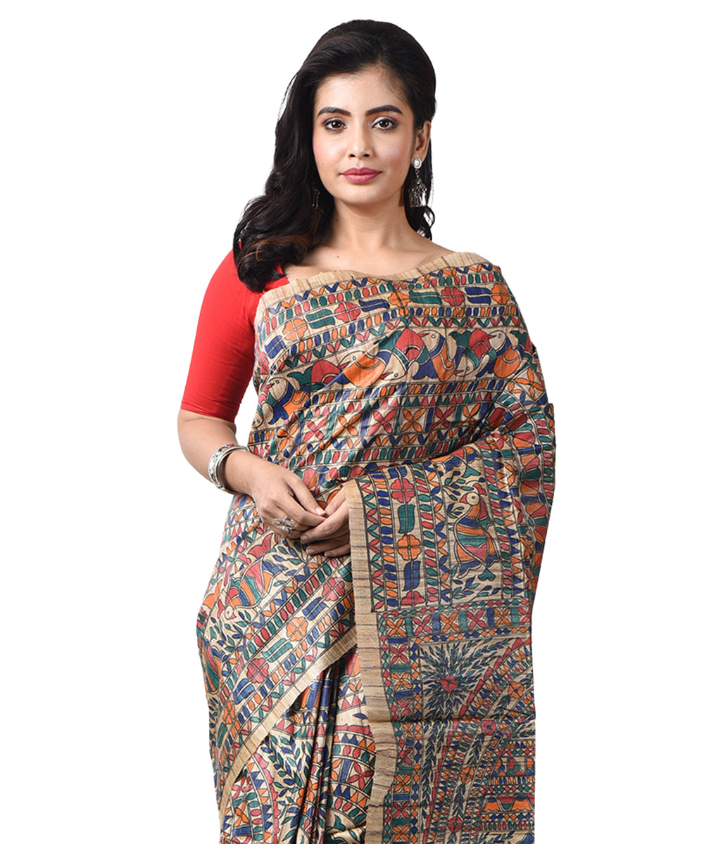 Beige tussar silk hand painted multicolor madhubani saree