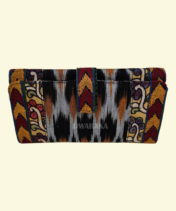 Black hand painted kalamkari and threadwork ikat cotton clutch