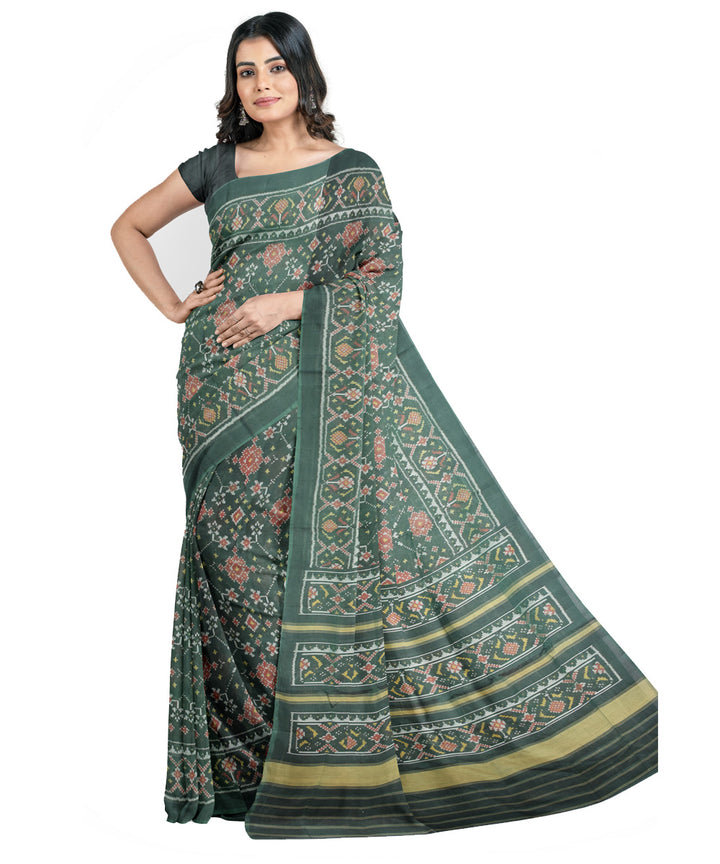 Dark green hand loom cotton patola saree