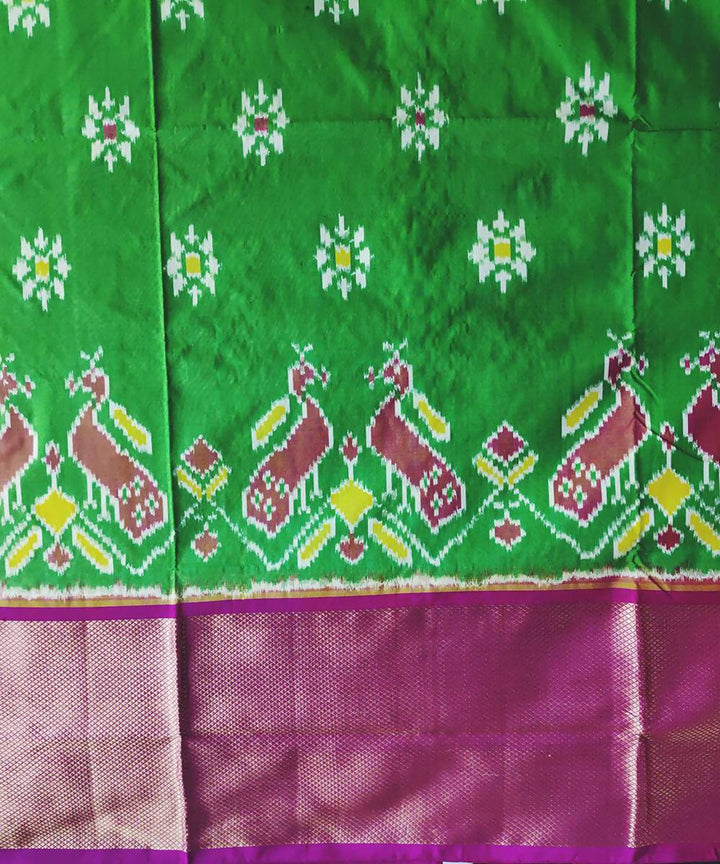 Green and pink handwoven ikat silk pochampally saree