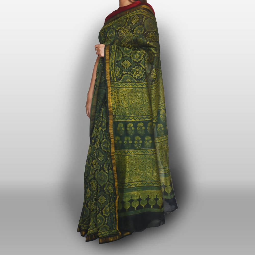 Green ajrakh saree on chanderi with nakshi border