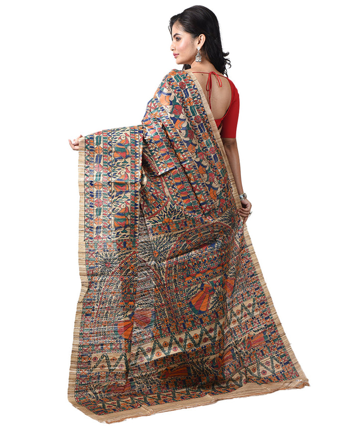 Beige tussar silk hand painted multicolor madhubani saree