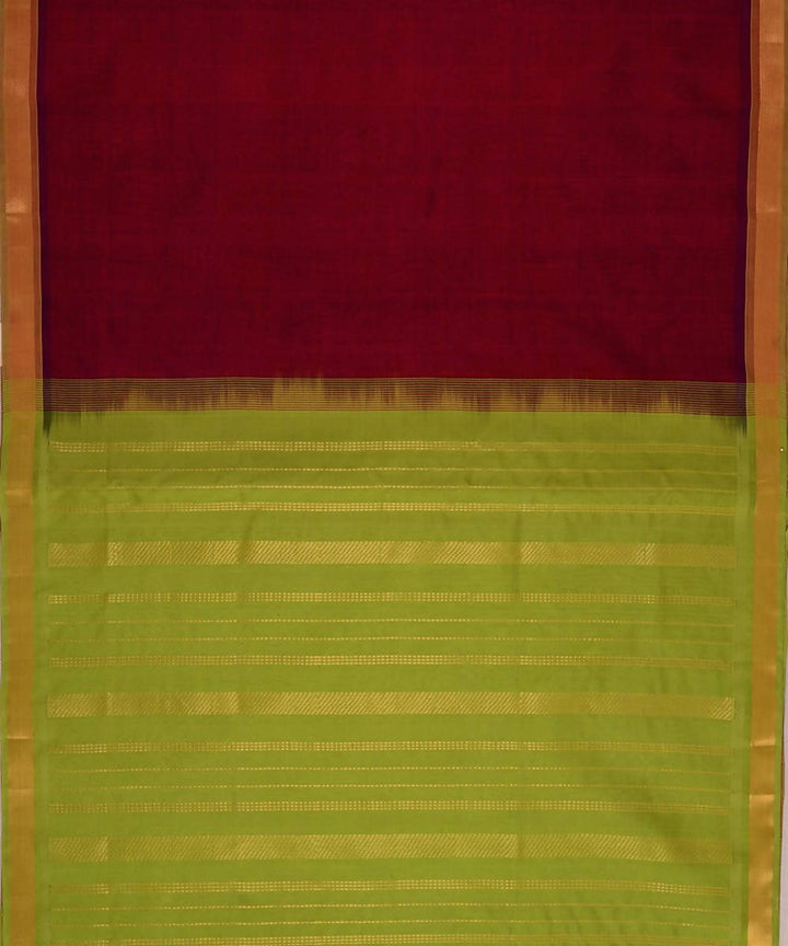 Dark red kanjivaram silk cotton saree with green border
