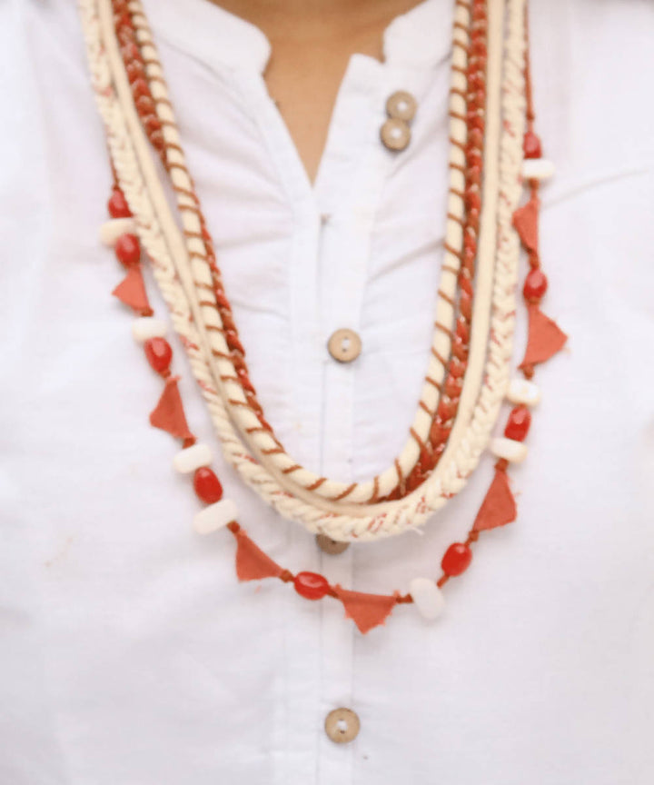 Cream and rust handmade cotton and ruby stone necklace