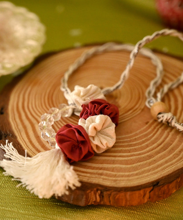 Red cream handcrafted silk rakhi