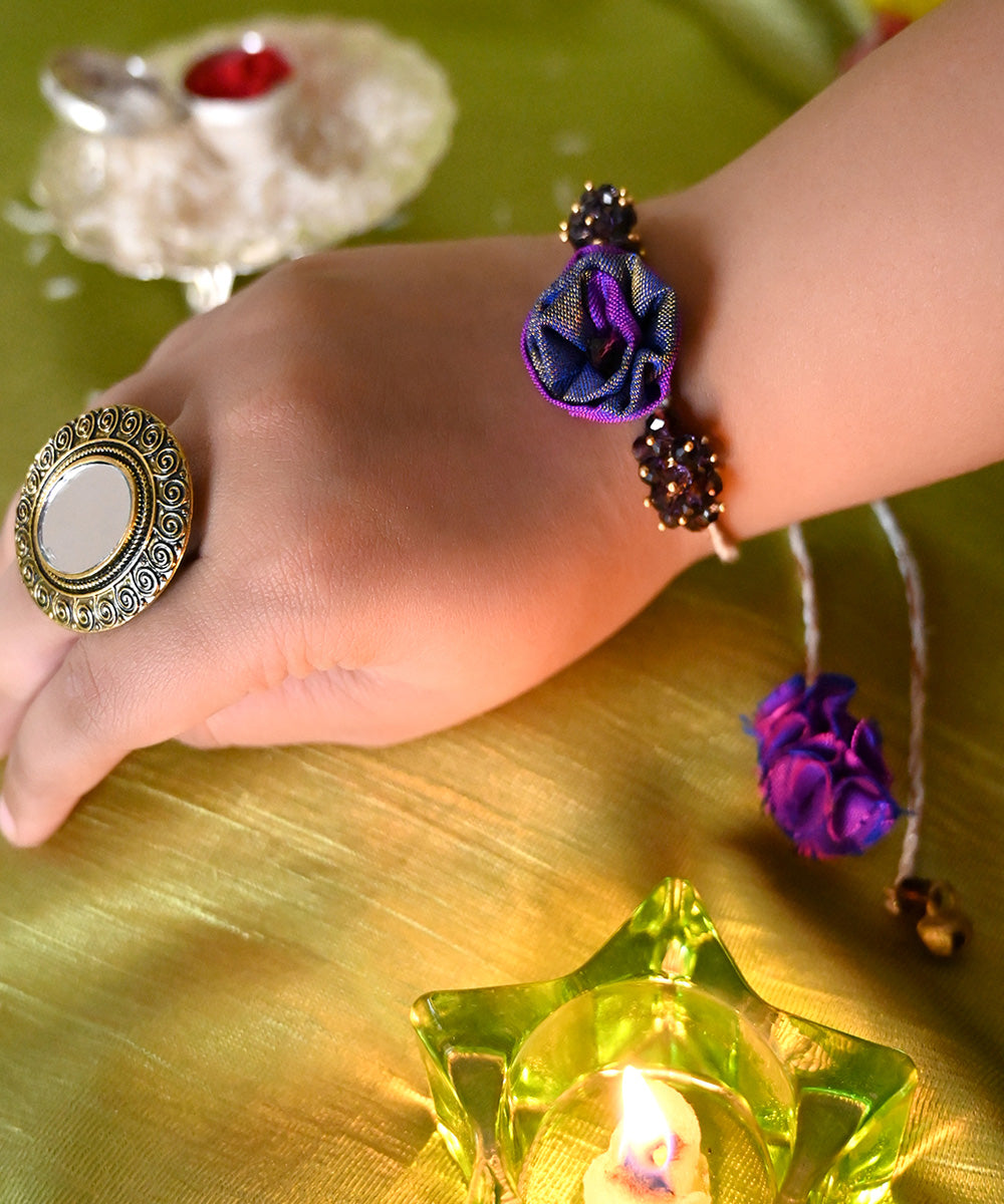 Handcrafted purple silk rakhi