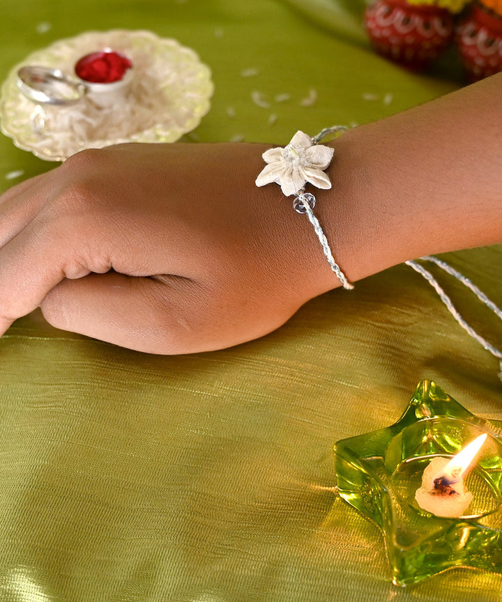 Cream handcrafted silk rakhi