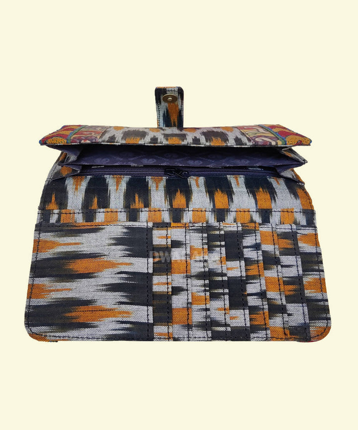 Black hand painted kalamkari and threadwork ikat cotton clutch