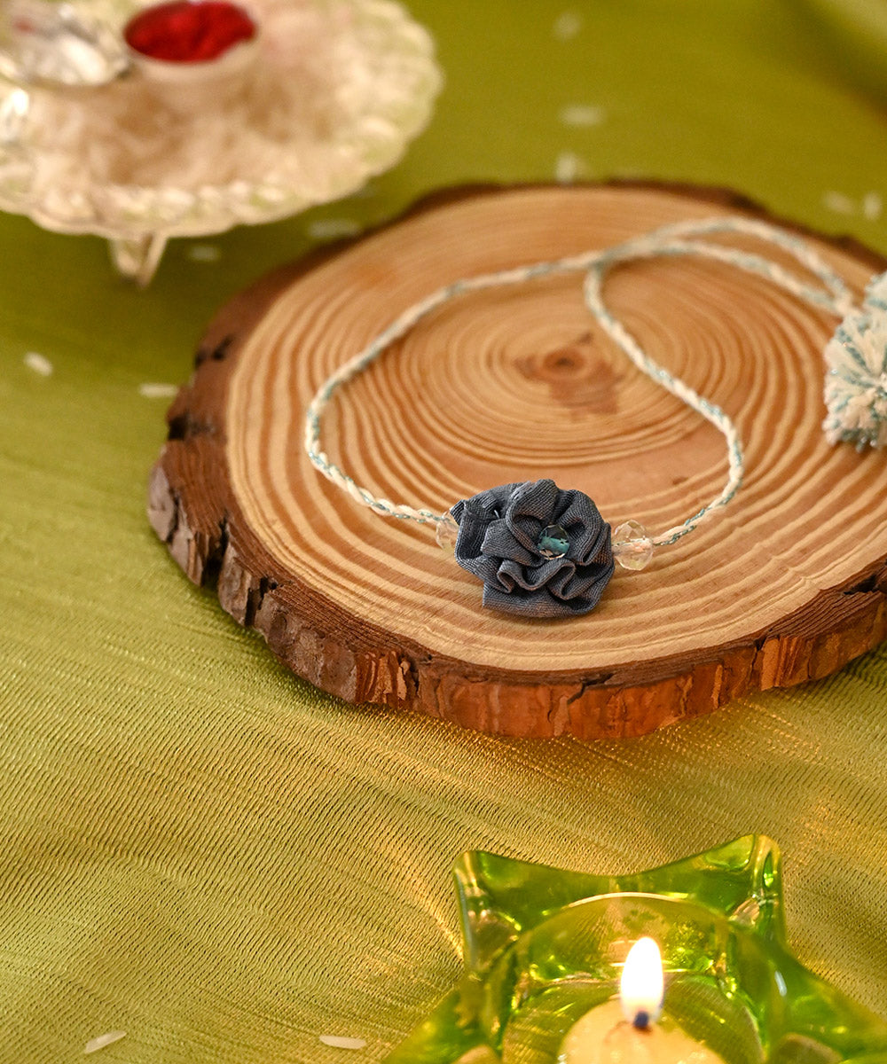 Grey handcrafted silk rakhi