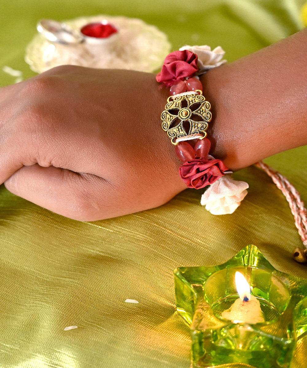Red cream hand crafted silk rakhi