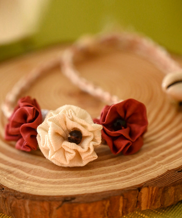 Dark red cream handcrafted silk rakhi