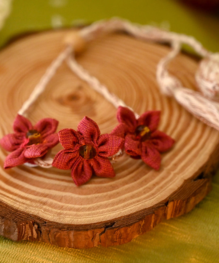 Handcrafted red cream silk rakhi