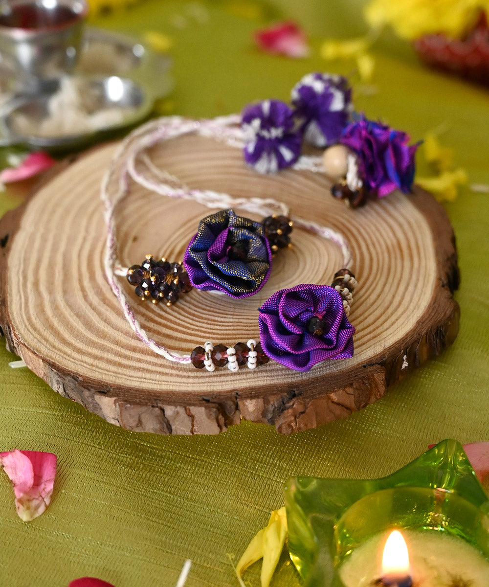 Purple cream handcrafted silk rakhi