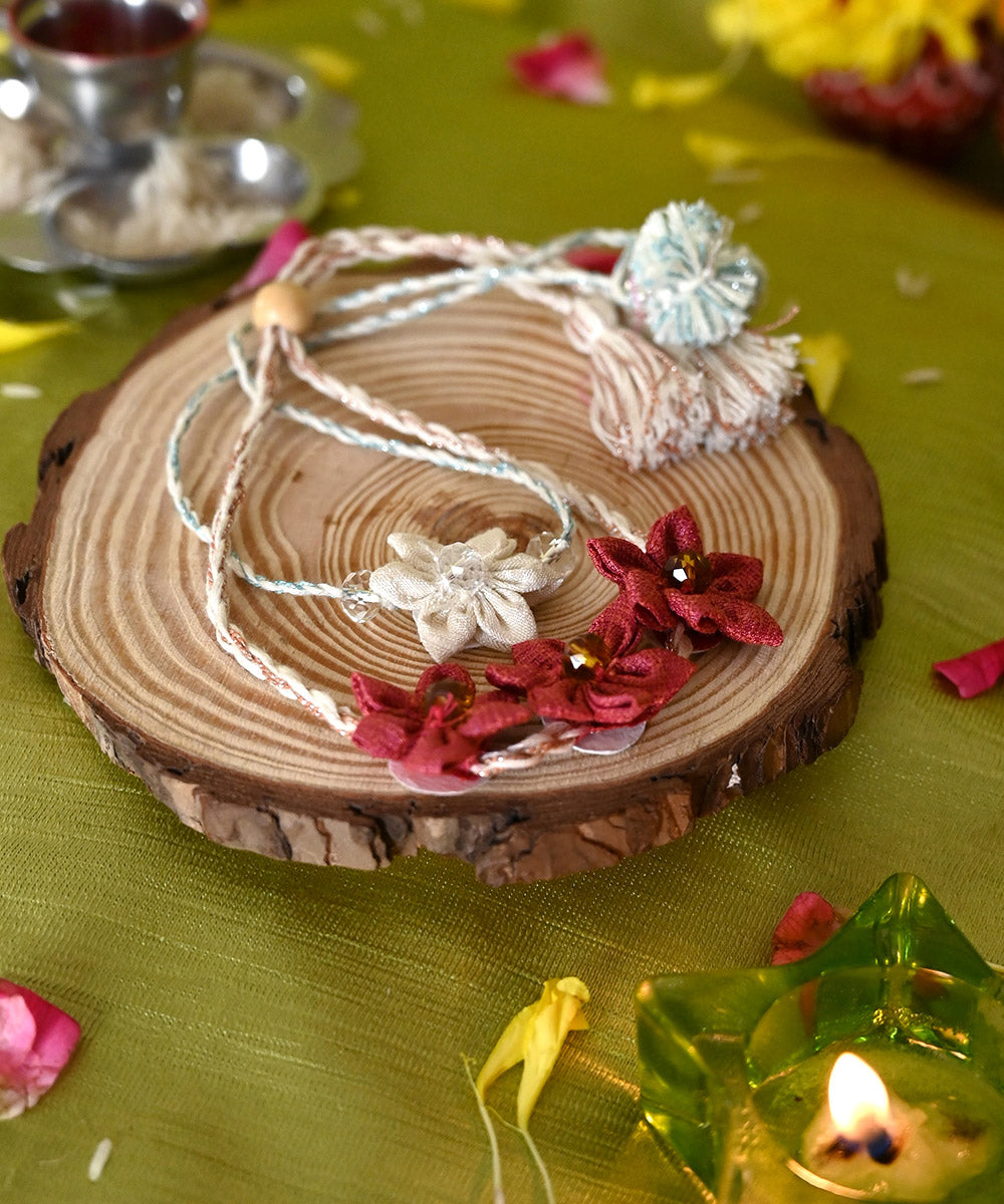 Handcrafted dark red silk rakhi