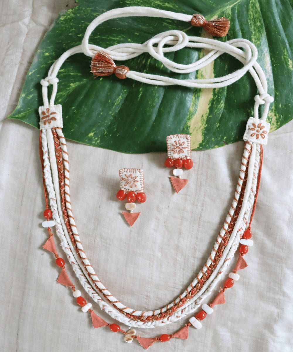 Cream and rust handmade cotton and ruby stone necklace