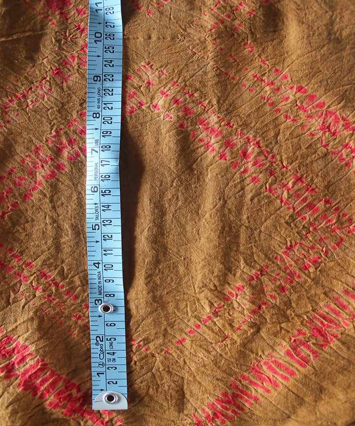 Yellow brown and pink shibori tie dye printed cotton fabric