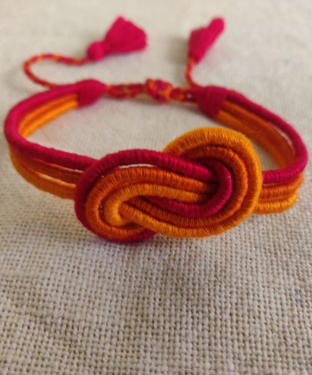 Handcrafted floral multicolor rakhi in mercerised cotton thread