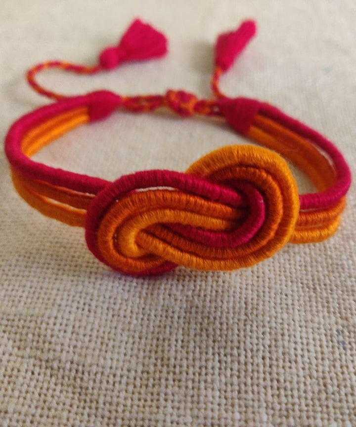 Handcrafted floral multicolor rakhi in mercerised cotton thread