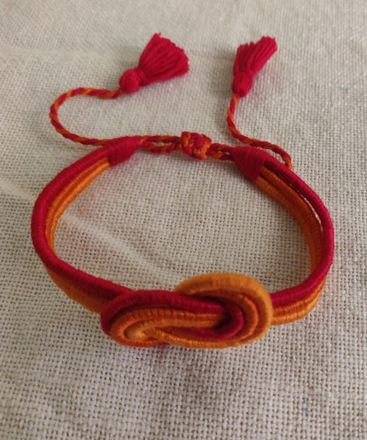 Handcrafted floral multicolor rakhi in mercerised cotton thread