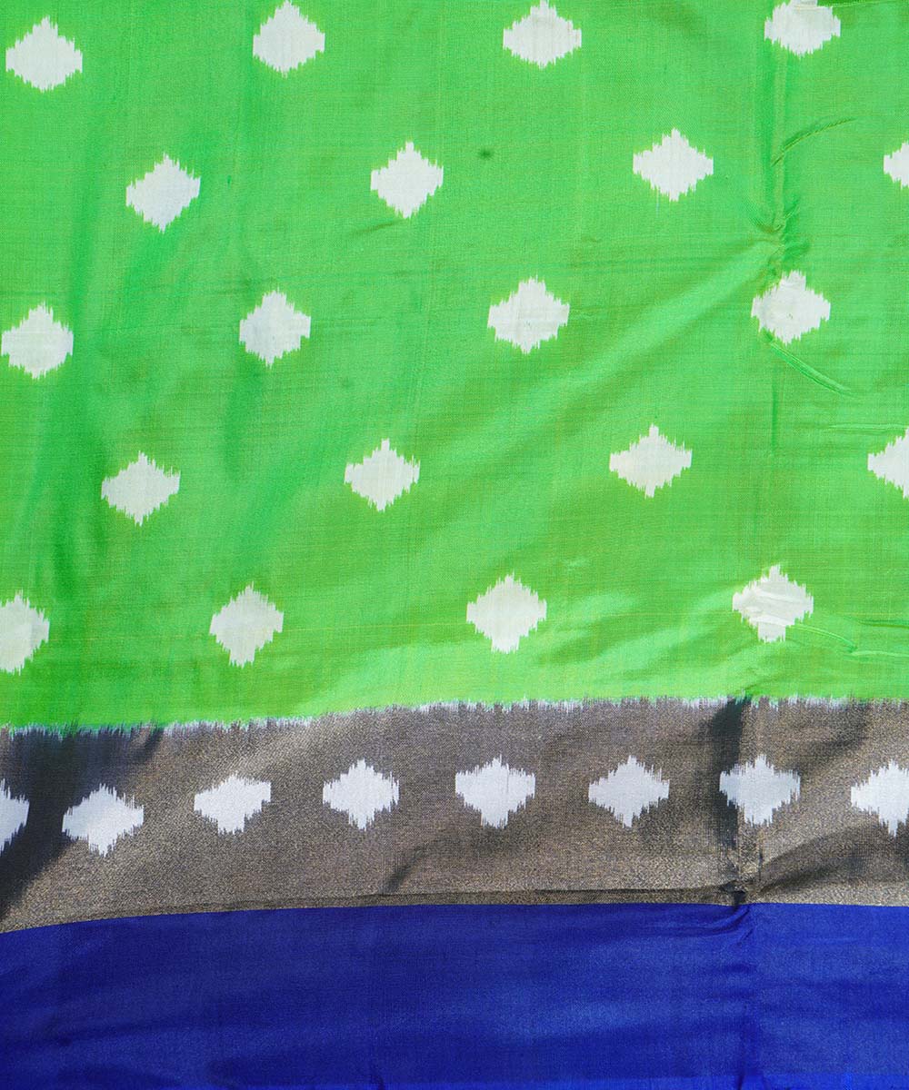 Bright green handwoven ikkat silk pochampally saree