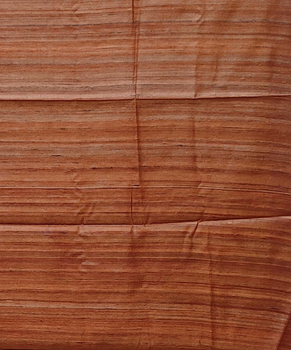 Cream orange handwoven block print tussar silk saree