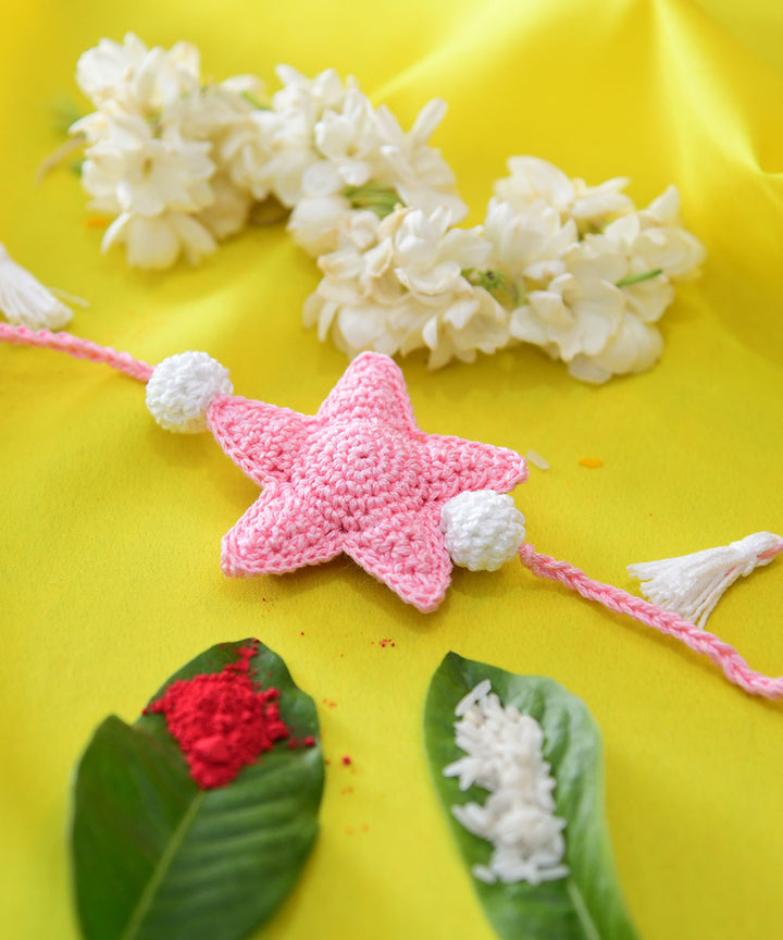 Light pink hand embroidery cotton rakhi