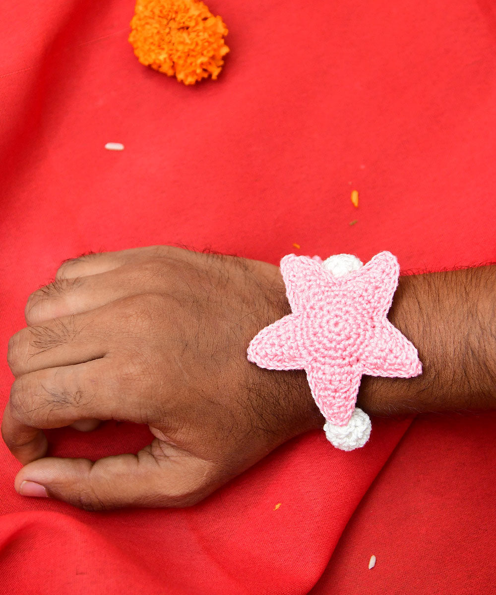 Light pink hand embroidery cotton rakhi