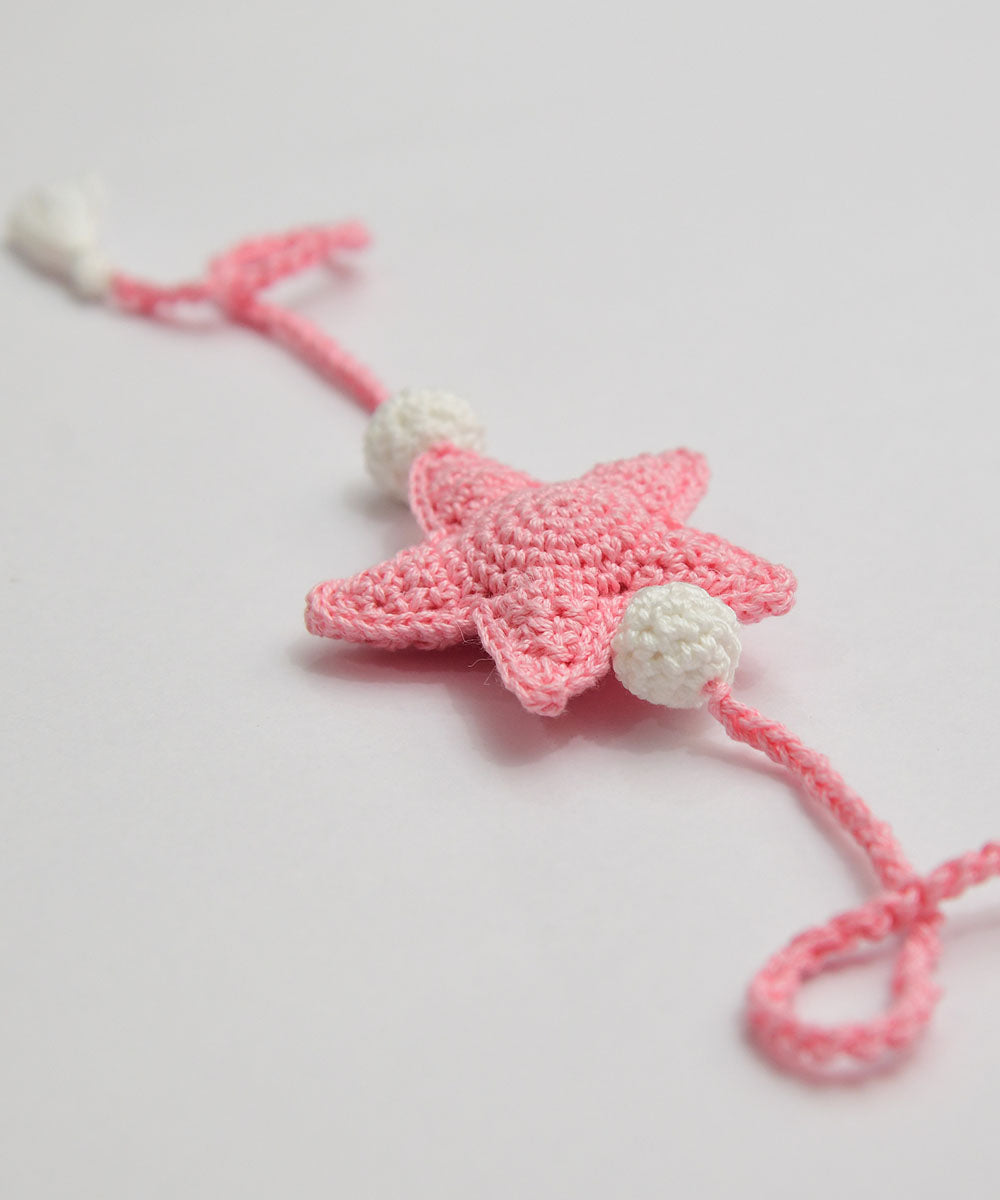 Light pink hand embroidery cotton rakhi