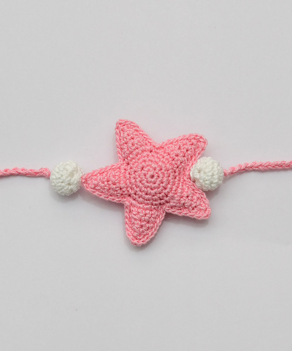 Light pink hand embroidery cotton rakhi