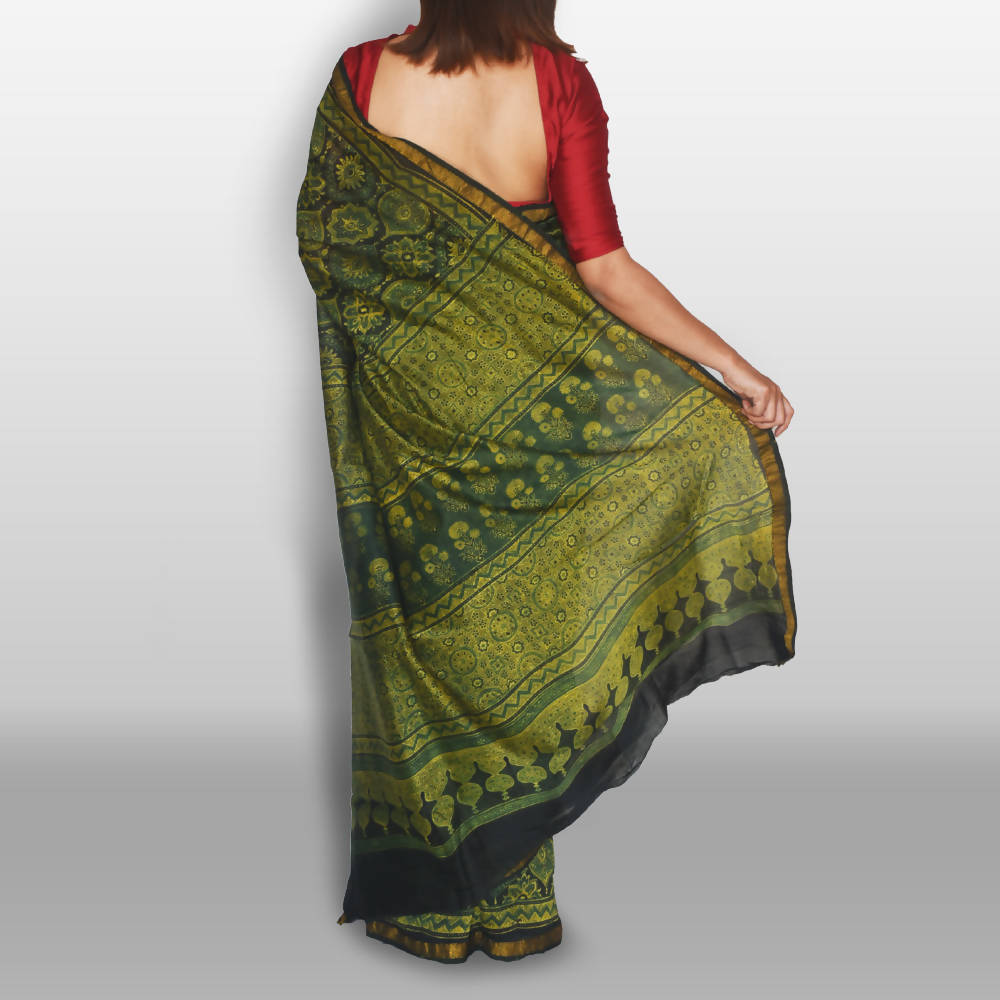 Green ajrakh saree on chanderi with nakshi border