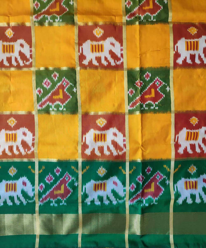 Green and yellow checks handwoven ikkat silk pochampally saree