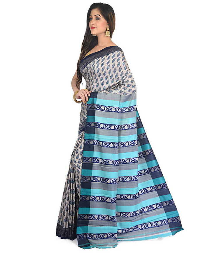 Off white and blue handblock printed eri silk saree