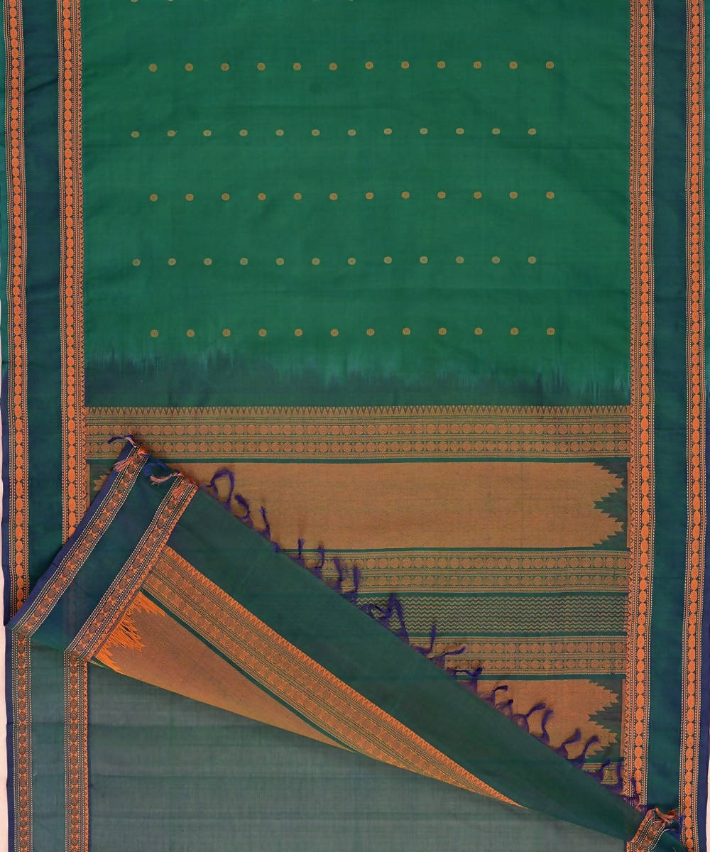 Bottle green kanchi silk cotton saree with butta and rudraksha border
