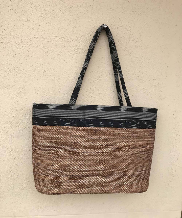 Brown with ikat panel handmade banana fibre bag