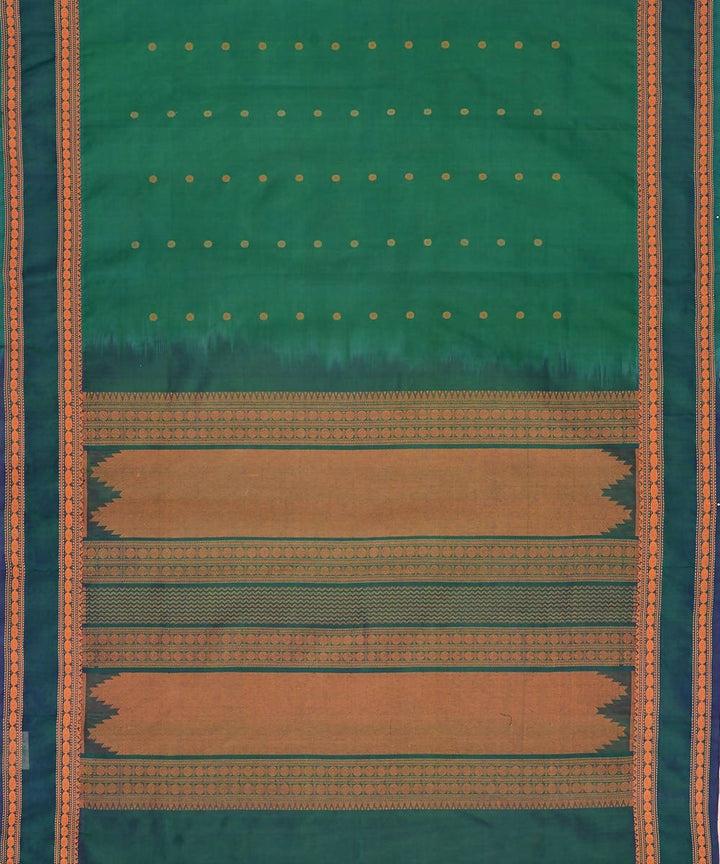 Bottle green kanchi silk cotton saree with butta and rudraksha border