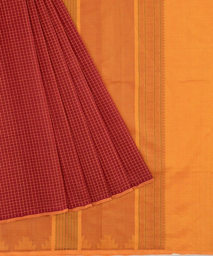Maroon kanchi silk cotton saree with checks and mustard pallu