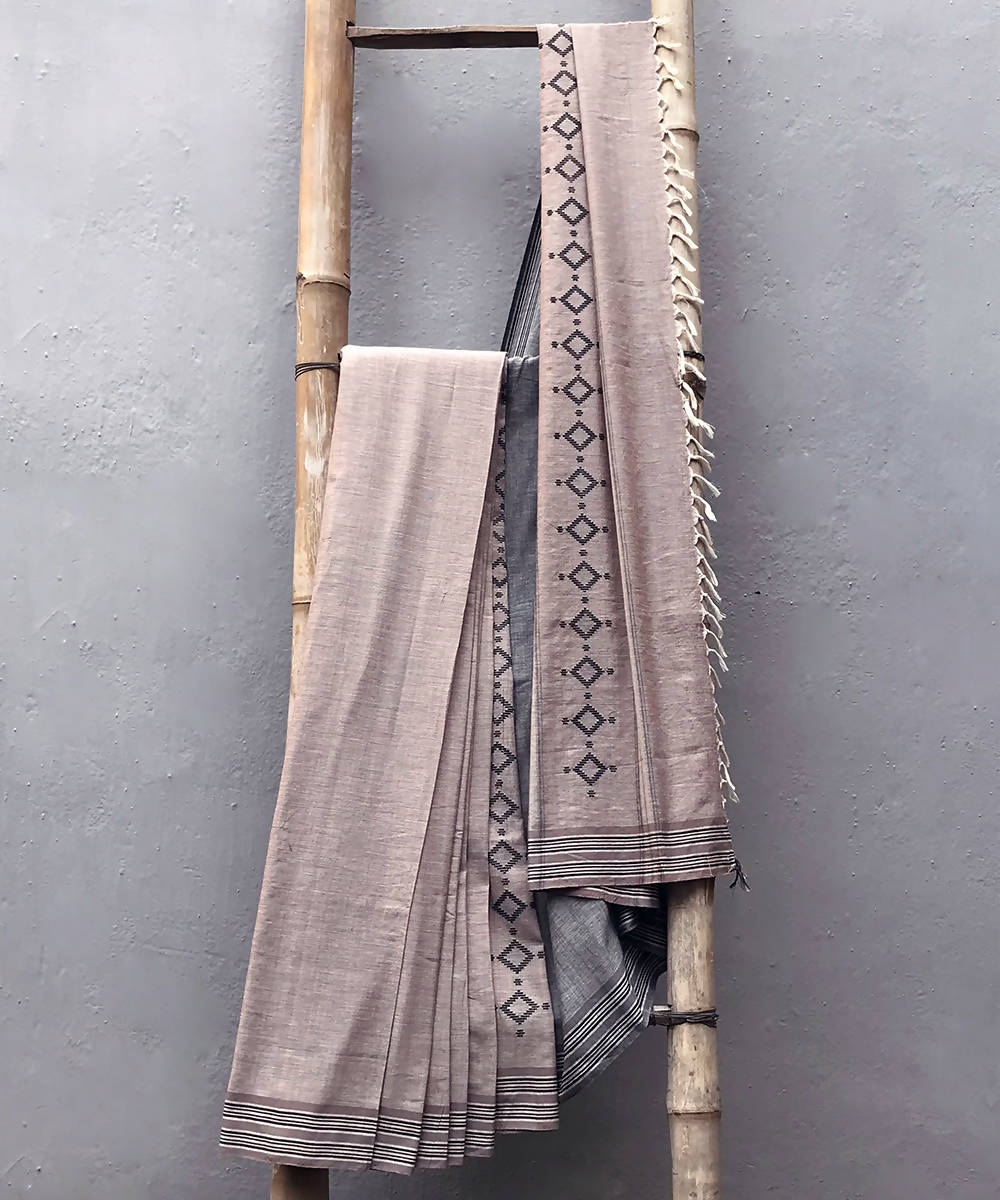 Light brown black handwoven extra weft cotton saree