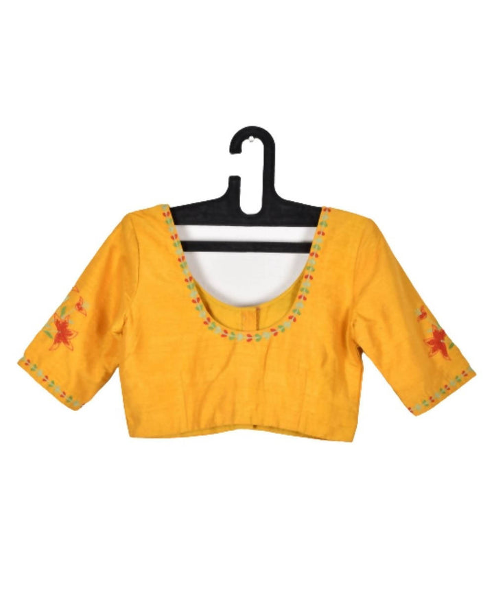 Yellow raw silk blouse with embroidery lily motifs