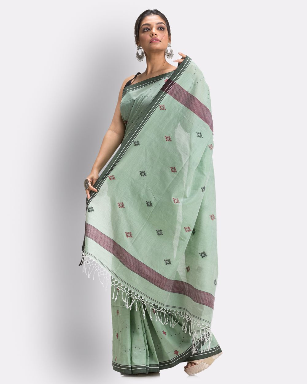 Light green celadon green handwoven cotton jamdani saree
