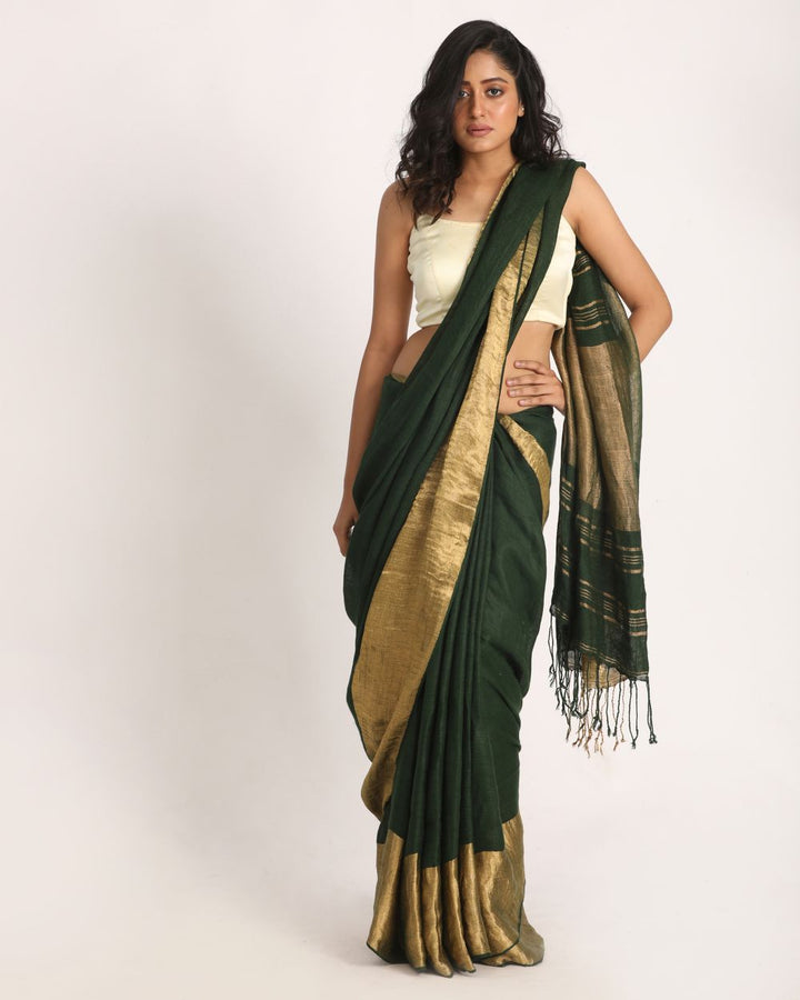 Dark green handwoven linen saree