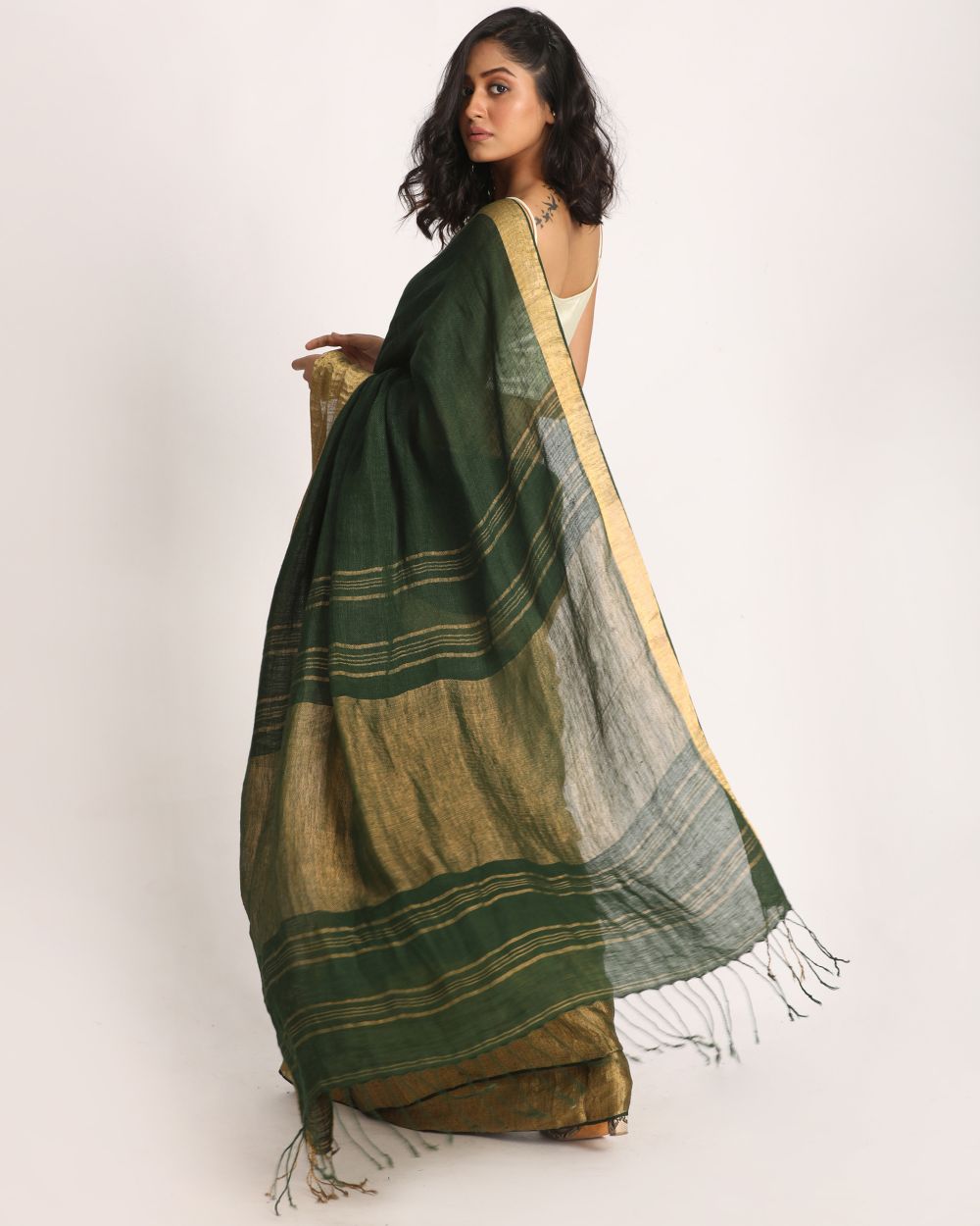 Dark green handwoven linen saree