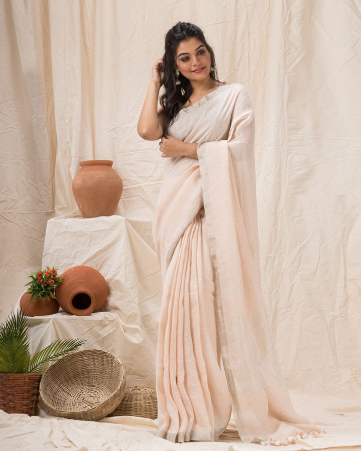 Faded pink handwoven linen bengal saree