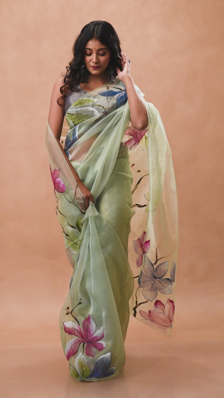 Light hand painted green handwoven organza silk saree