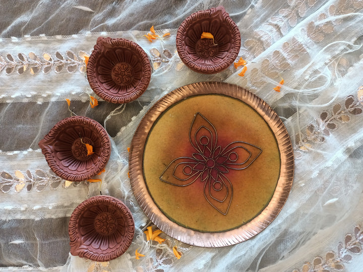 Yellow handcrafted pooja thali and terracotta diya set