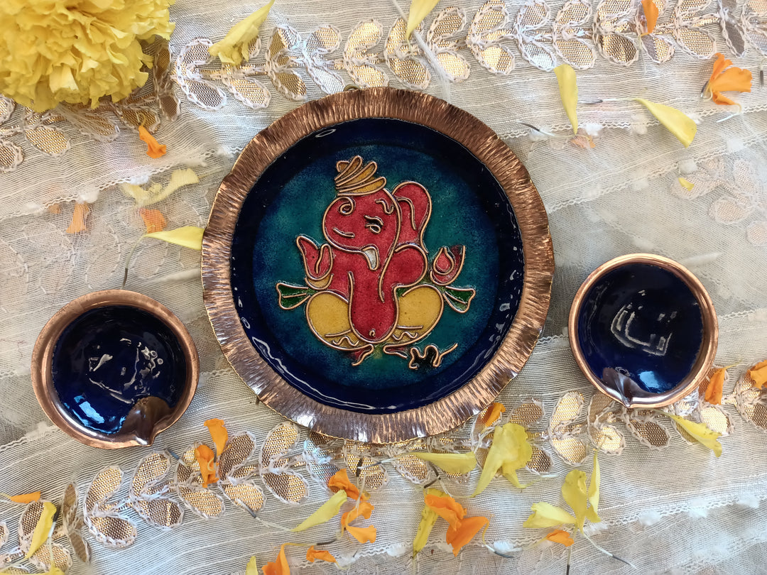 Blue handcrafted ganesh copper plate and diya set