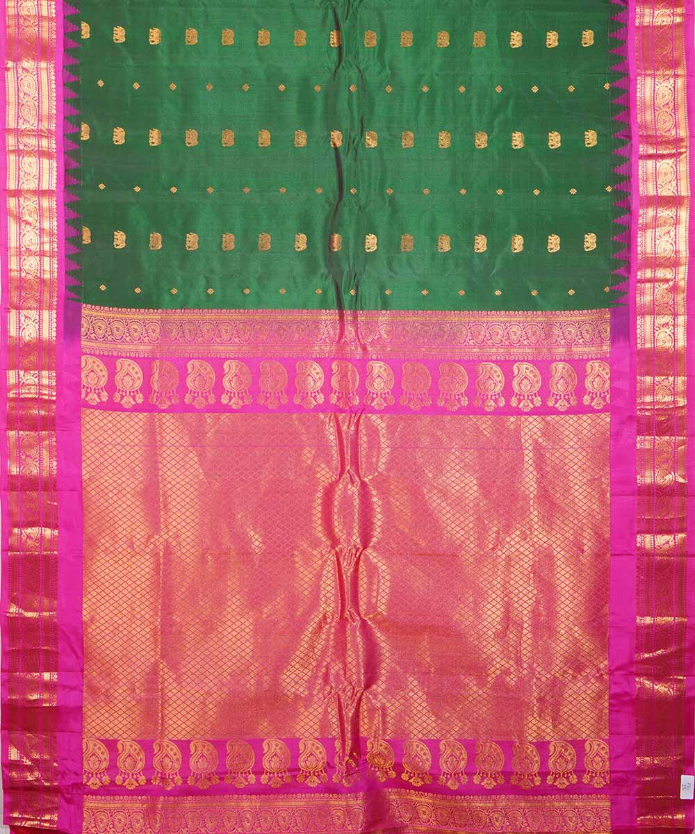 Dark green pink handwoven gadwal silk saree