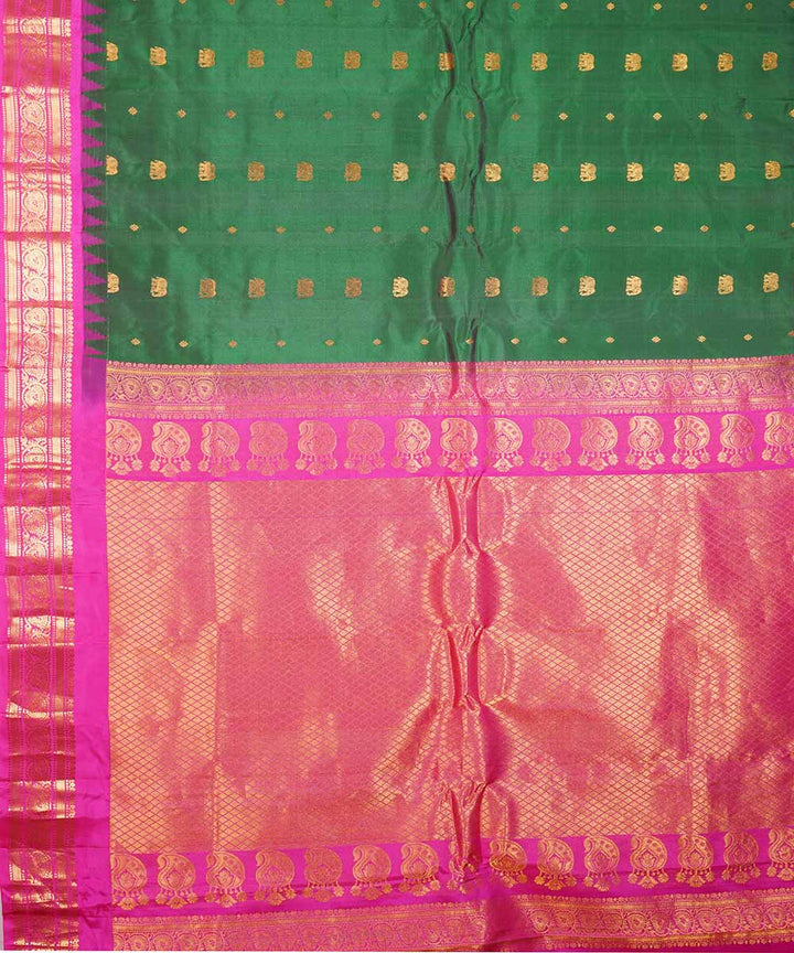 Dark green pink handwoven gadwal silk saree