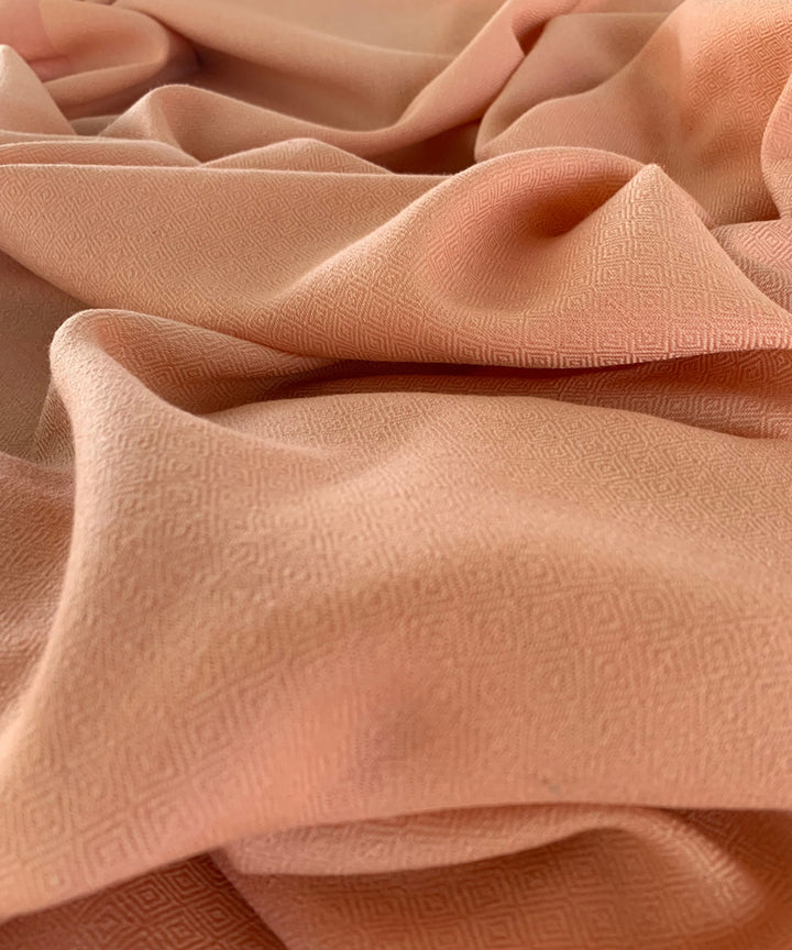 Light orange handwoven wool shawl