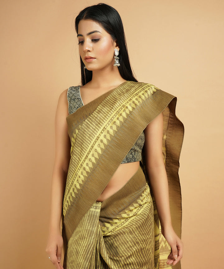 Olive green gheecha border cotton silk hand block dabu printed sari